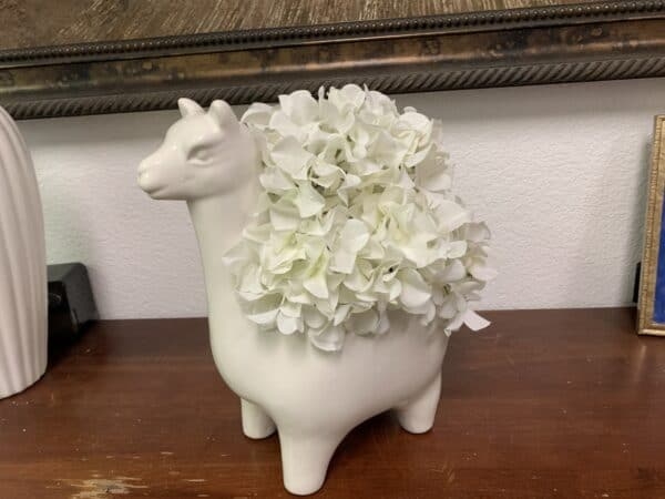Contact Pacific Silkscapes for a White Hydrangea in Llama silk flower arrangements