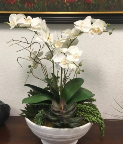 White orchids and succulents silk flower arrangements